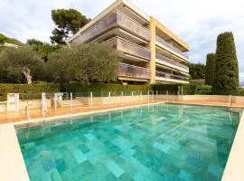 NICE luxury residence, Garden level with sea view and swimming pool, 2bedroom apartment of approximately 85 square meter and private garden