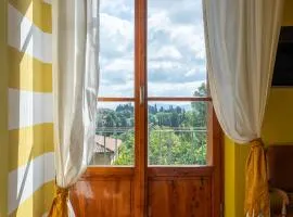 Colorful Tuscan Retreat Steps from Casole City Center
