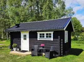 Mysig timmerstuga på dalagård