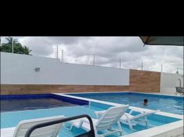 Condominio Reserva do Delta 1，巴納伊巴的小屋