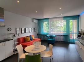 Bissone Apartment, מלון בביסונה