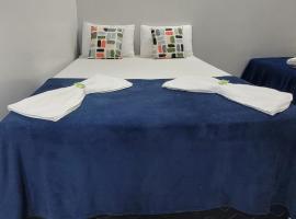 Quarto suíte 8, cama casal1, cama solteiro 1, hotel v destinaci Marabá