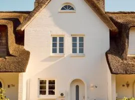 Reethus Keitum mit Kamin und Südgarten in direkter Wattnähe