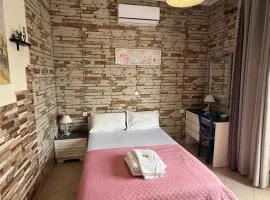 2-Bedroom Blue & White House with Garden and Beach