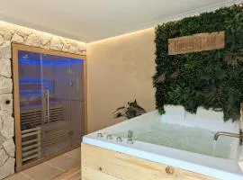 Cottage Lomy avec jacuzzi et sauna privatif