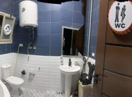 Room in shared house、New cairoのホテル