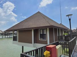 ST8 Sepang Golden PalmTree Family Villa 2 Bedroom: Sungai Pelik şehrinde bir plaj oteli