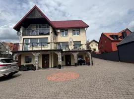 Pokoje nad jeziorem Mikołajki