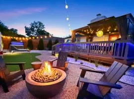 Modern 3BR Retreat with Fun Yard, Mini-Golf, Hot Tub & BBQ Dining Deck