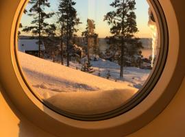 Branäs med vedeldad badtunna, hotel i Sysslebäck