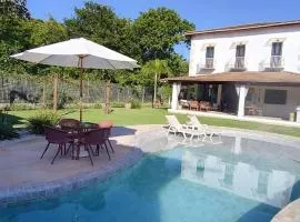 Villa Brama Mare - 4 suítes, piscina, limpeza e energia incluídas
