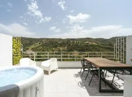 Sunny Flat w/ Jacuzzi & Balconies by Host Wise