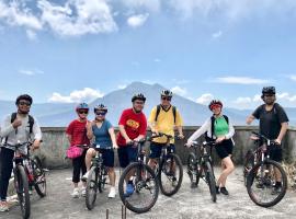 Downhill Cycling Ubud with Volcano, Jungle, Rice Terrace with meals, hotel di Tampaksiring