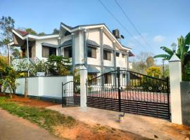 Riverview white villa, διαμέρισμα σε Madikeri