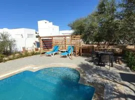 Appartement Les Oliviers avec piscine proche du lagon