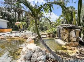 Tropical Home with Waterfall, HotTub & Fenced Yard for Pets