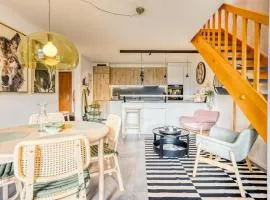 Spacieux duplex avec accès direct au bains