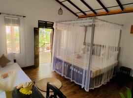 Ginger Harmony Guesthouse and Cafe，位于坦加拉的酒店