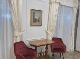 La camera degli Specchi Piazza Unità D'Italia, hotel v Terstu