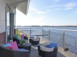 Waterfront penthouse with roof terrace and private jetty