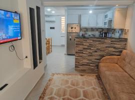 holiday apartment 3, hotel con estacionamiento en Jijel