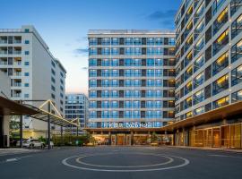 广州白云国际机场可可Coco酒店-广交会期间展馆免费穿梭巴士, hotel berdekatan Lapangan Terbang Antarabangsa Guangzhou Baiyun - CAN, Huadu