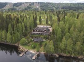 Large lakeside cabin in Tahko, No added fees, chal&eacute; alpino em Tahkovuori