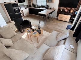 Belle Appartement t2 โรงแรมในTheix