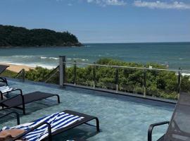 Suíte Familia com Hidro Frente Mar Blue Sea, khách sạn ở Itapema