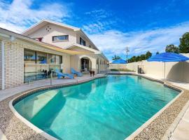 Bribie Beach House with Pool - Walk to Surf & Shops: Woorim şehrinde bir otel