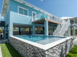 Blue Bungalow New Listing Canal Front Dock Pool