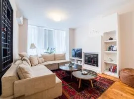 Maison Eleven Central 2-Bedroom Apartment with Balcony and Private Parking