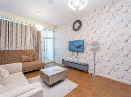 Luxury 2 bedroom next to beach with swimming pool gym and kids play area
