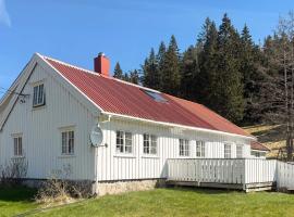 4 star holiday home in Grimstad, hotel com piscina em Grimstad