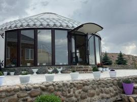Tasmal Yurt Camp, viešbutis mieste Tong