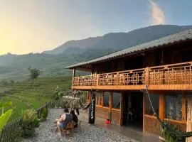Traditional Hmong House Among Rice Fields