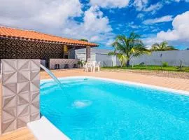 Casa com WiFi, churrasqueira e otima localizacao