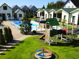 Domki wczasowe - Zielone Wzgórze - TOP COMFORT, hotel in Mielno