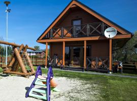 Sea view holiday home in Mielno with balcony, hotel in Mielno