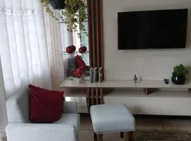 Casa confortavel com 2 quartos Wi-Fi e estacionamento numero 1