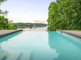 Secluded 3 Acre 5 BR Resort with a Private Heated Salt-Water Pool, Hot tub, Boat Dock, Sauna, and Game Room