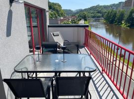Riverside Luxury Apartments & Café - Exclusive holiday house with river view, hotel in Železný Brod