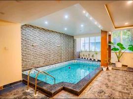 The Shore Travelista，位于瑞诗凯诗Dehradun Airport - DED附近的酒店