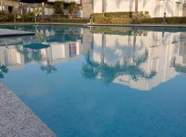 Appartement Familial avec Jardin, Résidence avec Piscine Dar El Bahr
