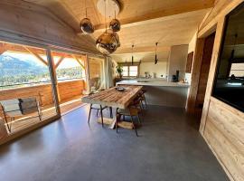 Luxury family Chalet with extraordinary Mountain views, Hotel in Trin