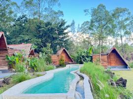 Triangular house and hot spring