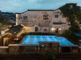 Hidden Moisture and Return to Simplicity Homestay in Mount Huangshan, hotel a Huangshan