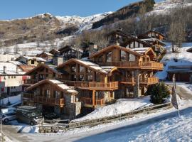Les Chalets de la Source 2 - Luxe - Skis aux pieds - 14 personnes, cabin in Saint-Martin-de-Belleville