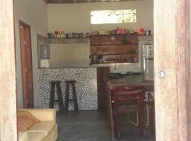 SUITE 01 - CASA GATA PITUBA 2 - ESPAÇO Pe DE JAMBO