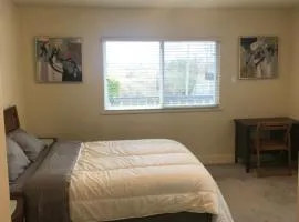 Spacious and bright bedroom with private bathroom
